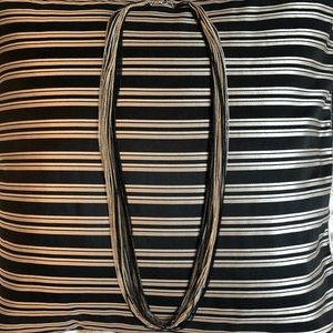 Long, multi colored chain link necklace.